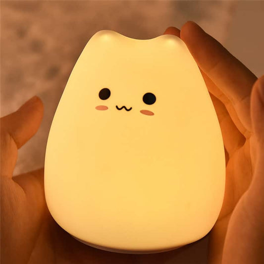 Lampe veilleuse pour bébé en forme de chaton de couleur orange vue de face