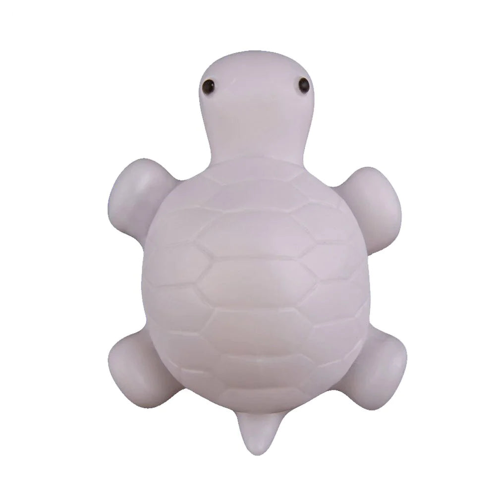Petite veilleuse en forme de tortue vue de dos